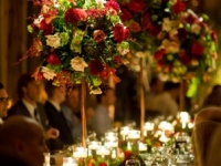 Estate style seating adorned with lush floral centerpieces WM Events