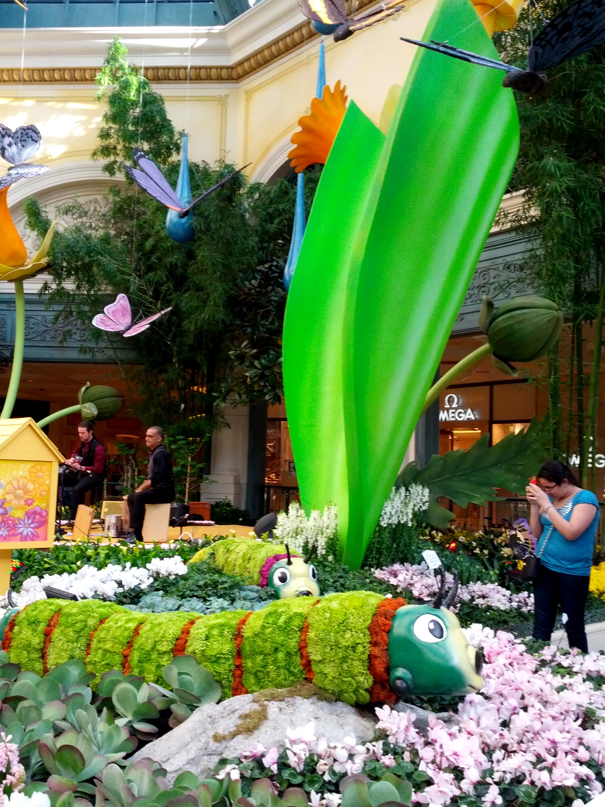 Las Vegas WM Events Wedding Coordinator Planner Bellagio Floral Arrangements Atrium Flowers Oversized Shovel