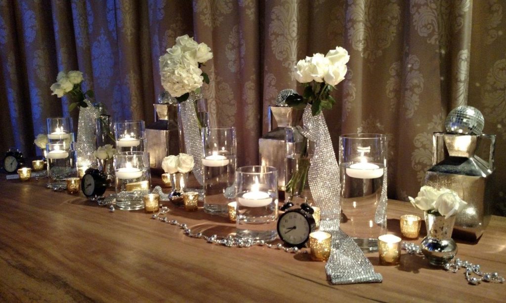 WM Events Design Planning Consulting Weddings Atlanta Georgia Unique Denver Colorado Wedding Planner Wedding Consultant Gunter Kitchen Showroom New Years Eve New Years Decor Floral Clocks Candles Floating Candles White Silver