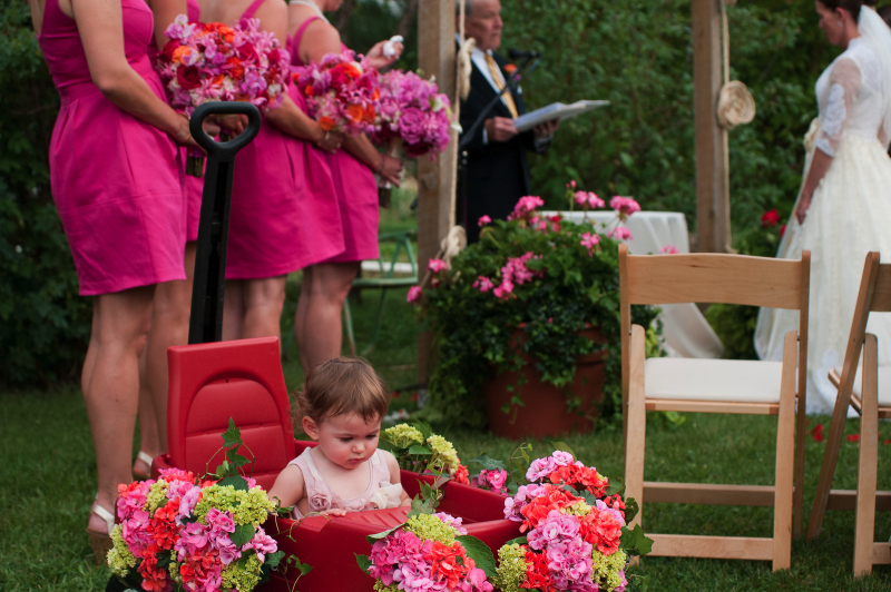 the-young-flower-girl-was-escorted-on-her-favorite-wagon-wm-events