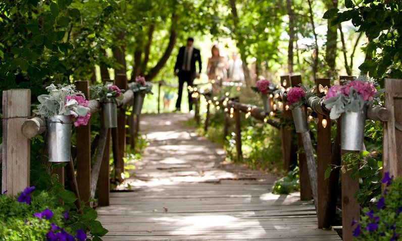 walkway over a creek on the organic farm boulder colorado wedding coordinator wm events