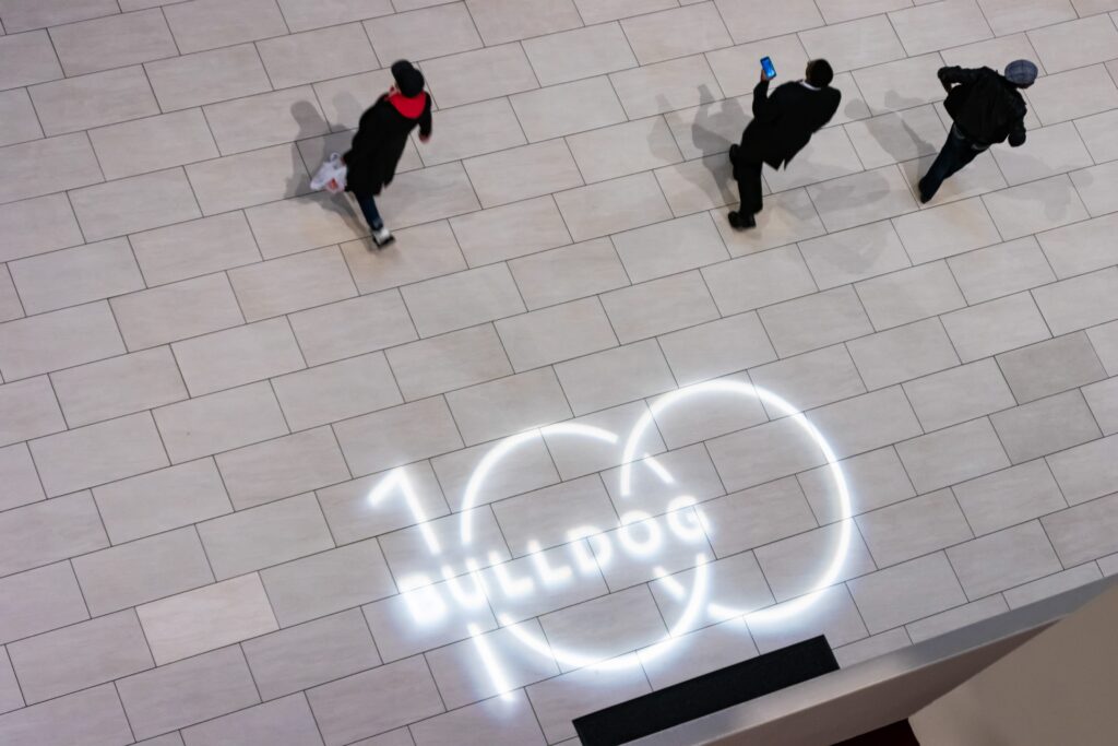 wm events, bulldog 100, university of georgia, uga, 2019 events, modern events, black and white, geometric design, event planner, event designer, hyatt regency events, atlanta events, georgia events, corporate events, social events, non-profit events, white floral, white flowers, custom centerpieces, table numbers, custom branding, ballroom, seated dinner, plated dinner