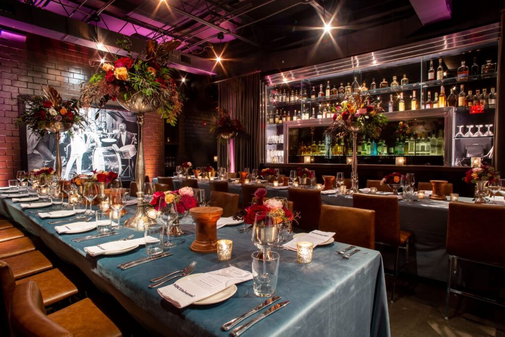 wm events, private dinner, private events, kr steakbar, floral designer, floral design, lush florals, dark and moody, red florals, red flowers, tall centerpieces, tall flower arrangements, tall floral arrangements, tablescapes, velvet linen, nbc, nbcuniversal, super bowl dinner, atlanta event planner, atlanta events, georgia events, event planning, event designer, event designing, corporate events, high end corporate