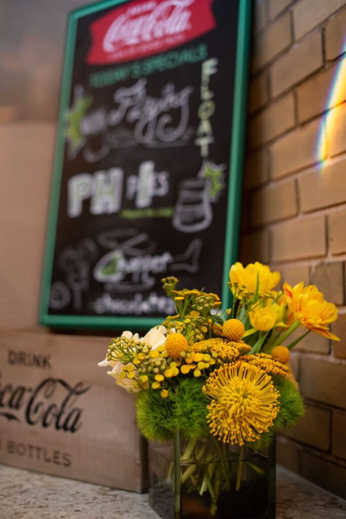 wm events, deutser, skylounge, glenn hotel, rooftop events, rooftop, branded event, yellow floral, black and yellow, succulents, floral with succulents, helicopters, corporate events, social events, small gatherings, whiskey tastings, live entertainment, live guitarist, brent mcdonald, peter ferrari, live graffiti, graffiti art, custom graffiti, atlanta, georgia, atlanta events, georgia events, event design, event designer, event planner, event planning