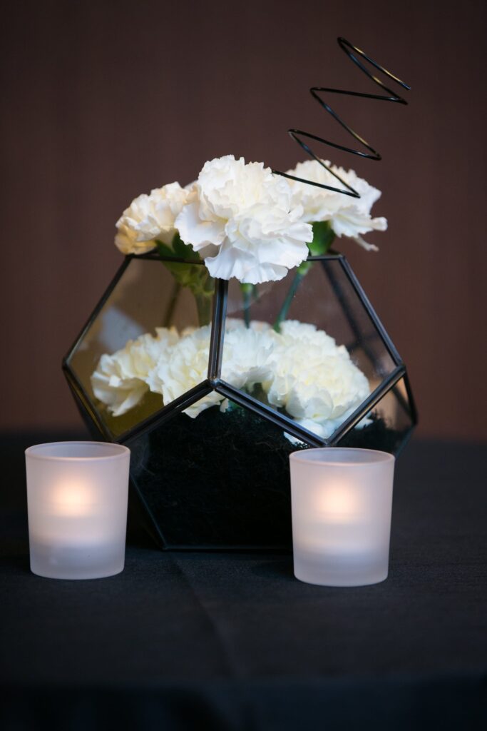 wm events, bulldog 100, university of georgia, uga, 2019 events, modern events, black and white, geometric design, event planner, event designer, hyatt regency events, atlanta events, georgia events, corporate events, social events, non-profit events, white floral, white flowers, custom centerpieces, table numbers, custom branding, ballroom, seated dinner, plated dinner