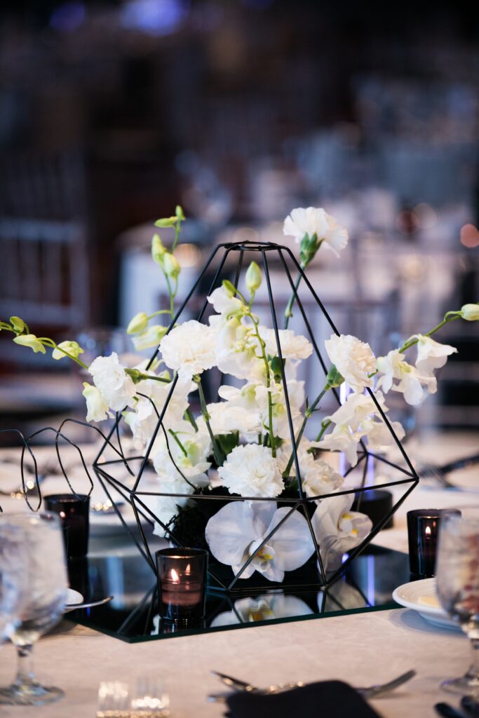 wm events, bulldog 100, university of georgia, uga, 2019 events, modern events, black and white, geometric design, event planner, event designer, hyatt regency events, atlanta events, georgia events, corporate events, social events, non-profit events, white floral, white flowers, custom centerpieces, table numbers, custom branding, ballroom, seated dinner, plated dinner