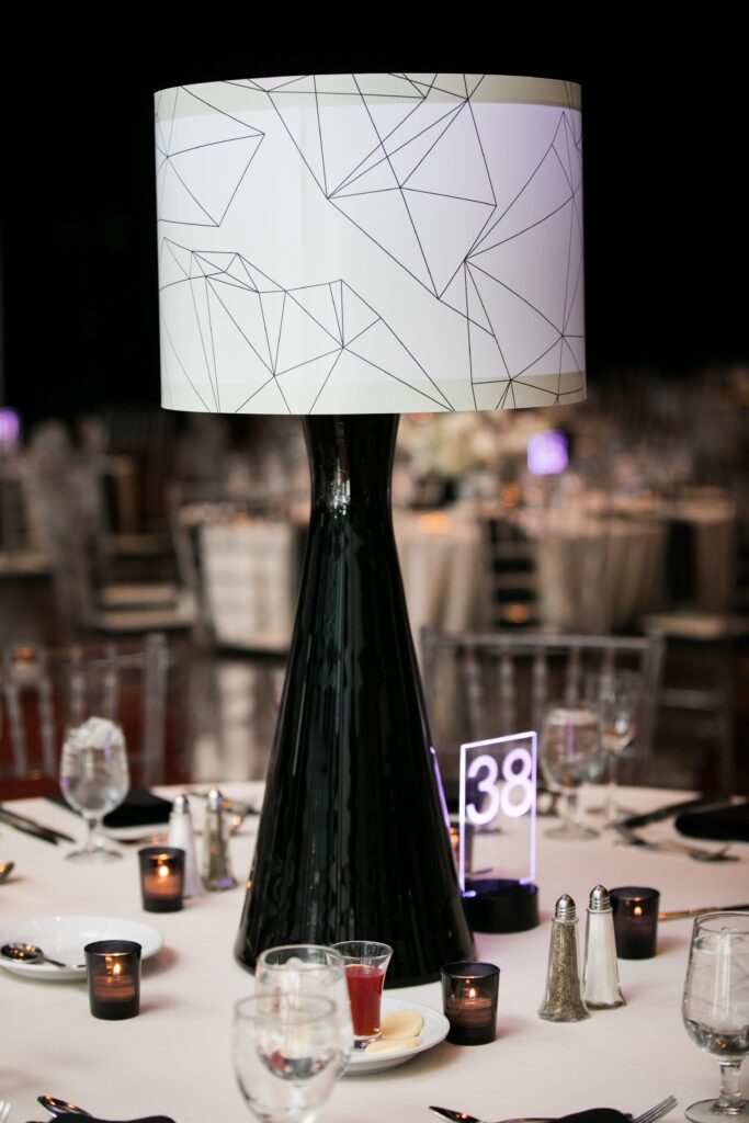 wm events, bulldog 100, university of georgia, uga, 2019 events, modern events, black and white, geometric design, event planner, event designer, hyatt regency events, atlanta events, georgia events, corporate events, social events, non-profit events, white floral, white flowers, custom centerpieces, table numbers, custom branding, ballroom, seated dinner, plated dinner