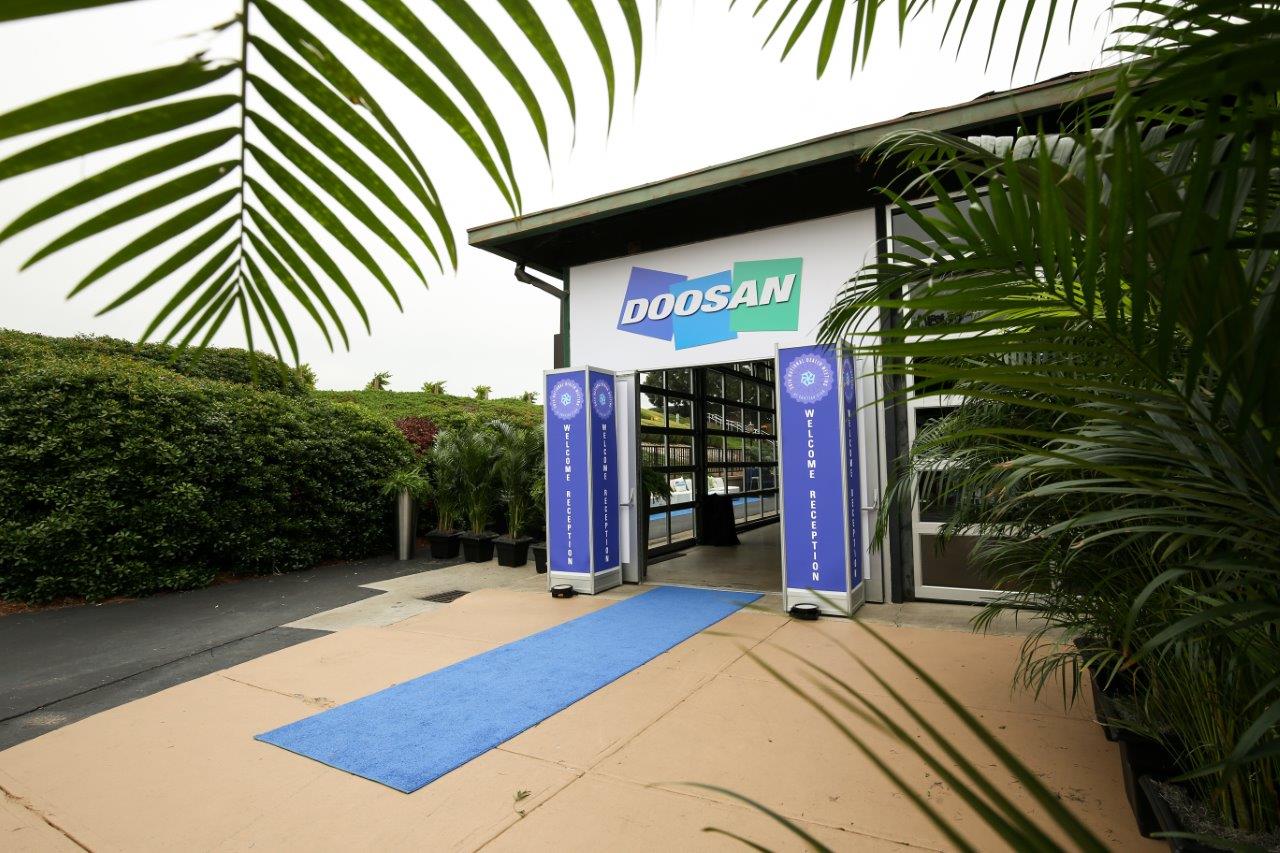 modular image, WM Events, Doosan, Event Planner, Event Designer, Event Producer, Corporate Event, Event Planning, Event Designing, Event Production, Event Design, Designer, Chateau Elan, Winery, Chateau Elan Winery, Winery Pavilion, International Events, Meetings, Corporate Meetings, National Dealer Meeting, National Meeting, Custom, Branding, Event Branding, Corporate Branding, Custom Chandelier, Lounge, White Lounge, Lounge Grouping, Custom Pillows, Silk-Screen Pillows, Orange Floral, Branded Centerpieces, Event Drapery, Plant Peddler, PWP Studio, Forklifts, Industrial, Corporate Industrial, Industrial Event, Chateau Elan Events, Custom Graphics, LED, AFR, AFR Event Furnishings, Monte Carlo Productions, MCP, Monte Carlo, Atlanta, Georgia, Atlanta Events, Georgia Events, Denver, Colorado, Events, Denver Events, Colorado Events, International, National, Social Events, Reception, Welcome Reception, Corporate Meeting, Corporate Planner