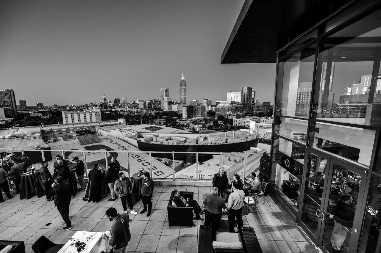 modular image, wm events, deceuninck, ventanas, pwp studio, event photography, event planning, event design, event planner, event designer, atlanta events, glassbuild america, downtown atlanta, floral design, blue, gold, 50-year anniversary, corporate anniversary, graphics, branding, corporate branding, events, corporate events, social events, non-profit events, oversized design, oversized letters, giant letters, skyline, altanta skyline